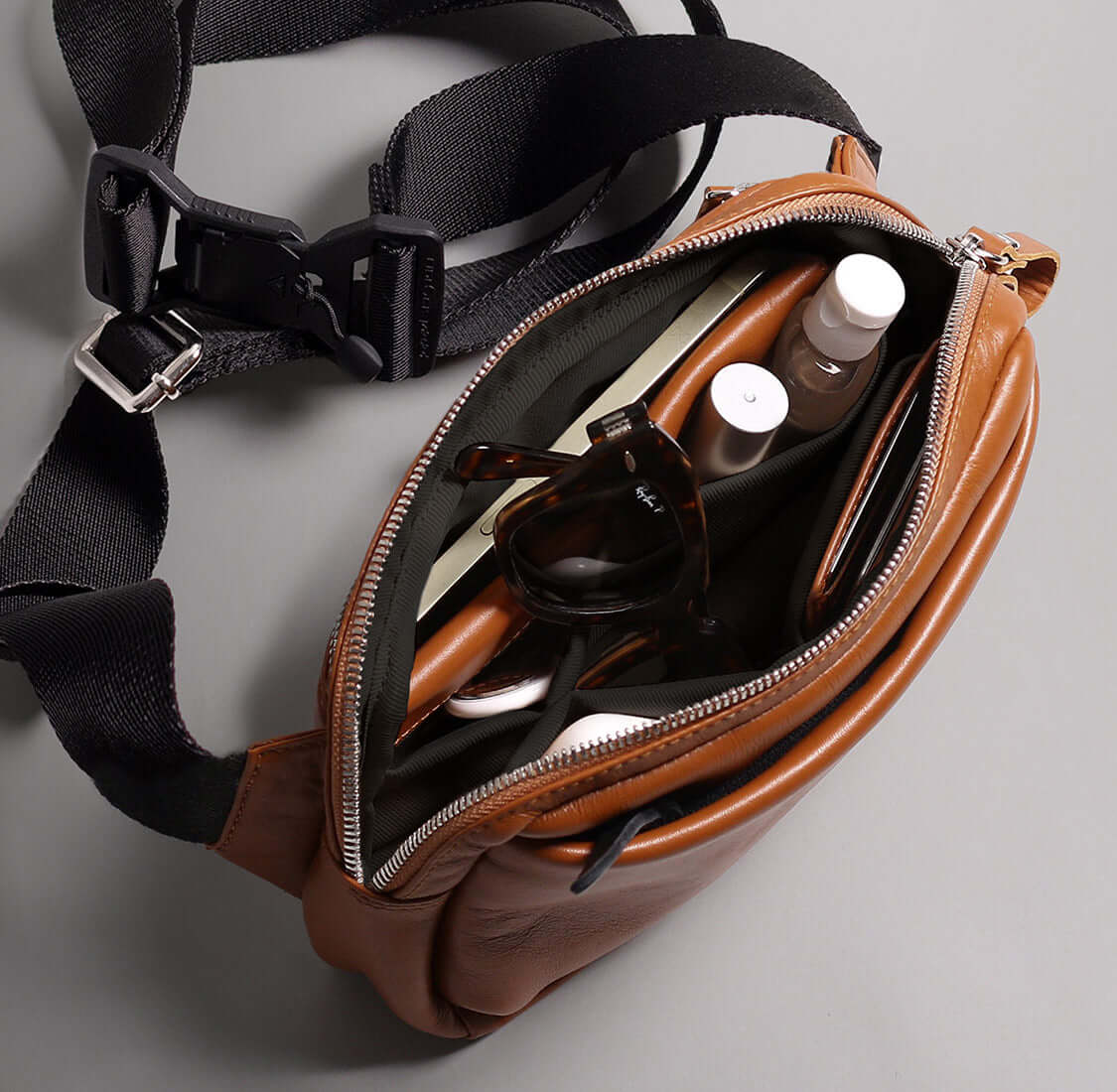 Leather sling bag for travel