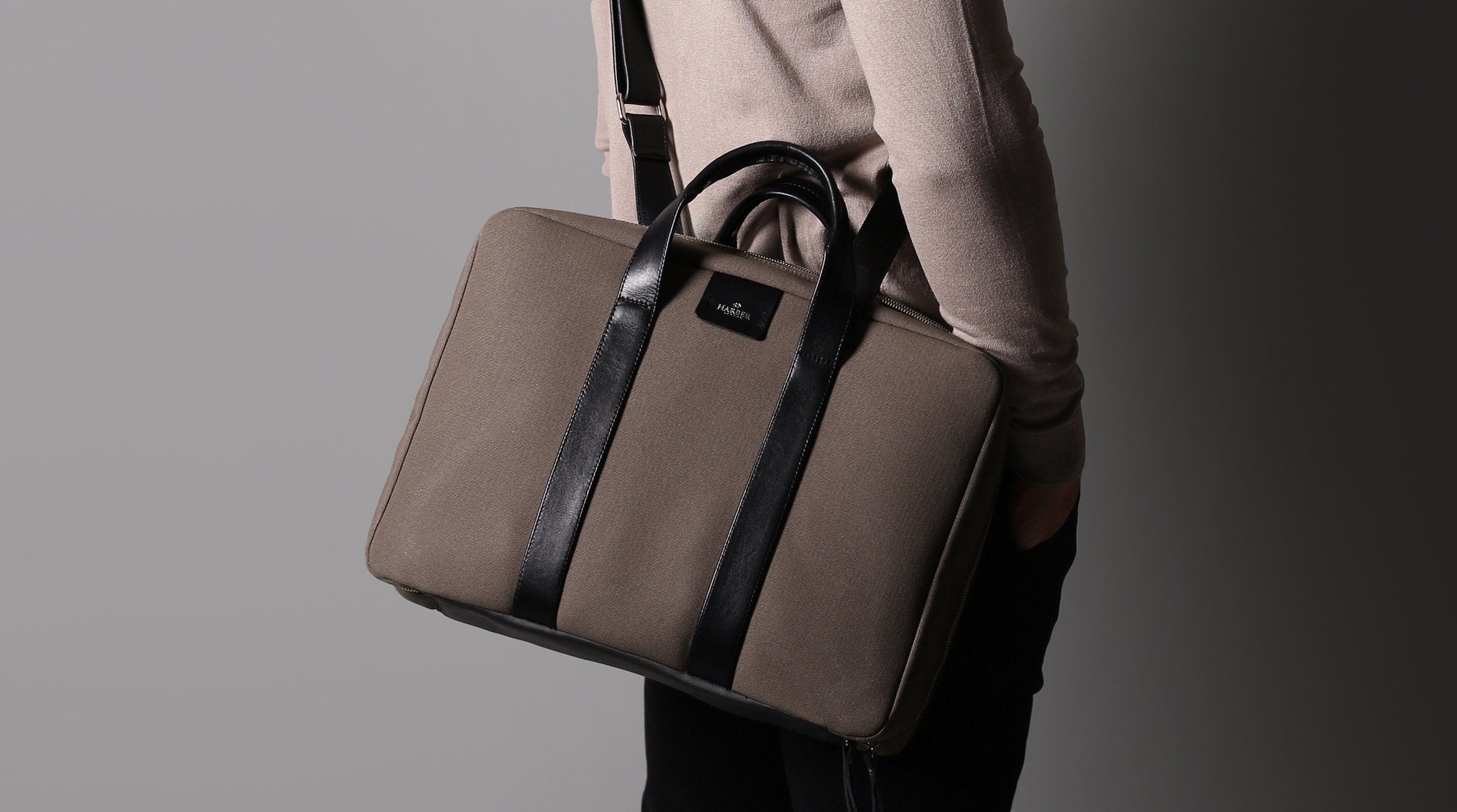 Handcrafted laptop briefcase with carry strap.