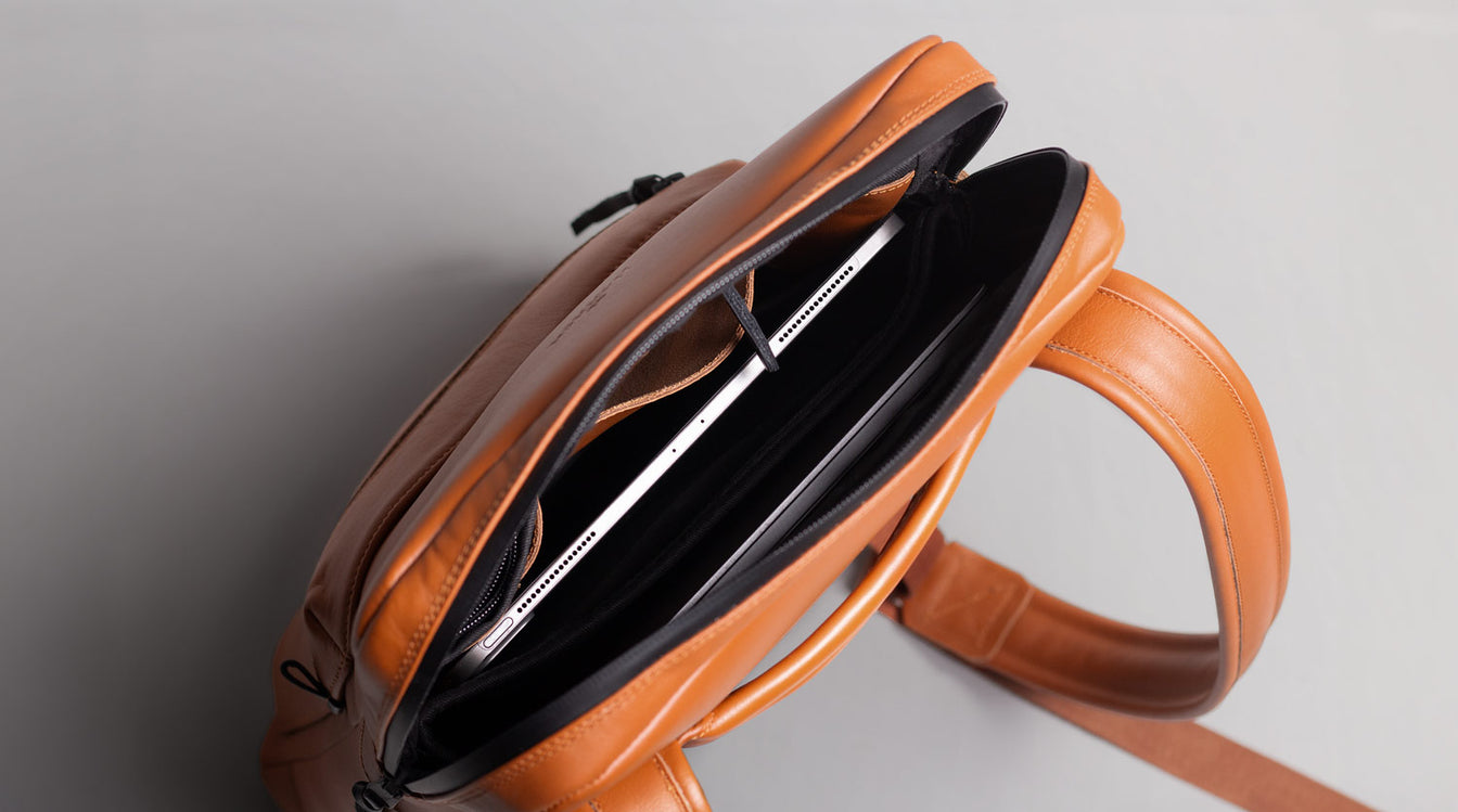 Slim leather backpack for tablets and laptops