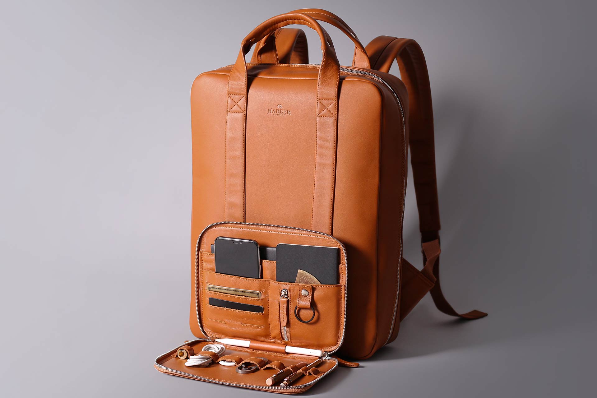 black friday leather backpack Men's Perfecto in Matte a zippered back sleeve to affix the bag to carry Pumpkin Red Leather Backpack Rucksack