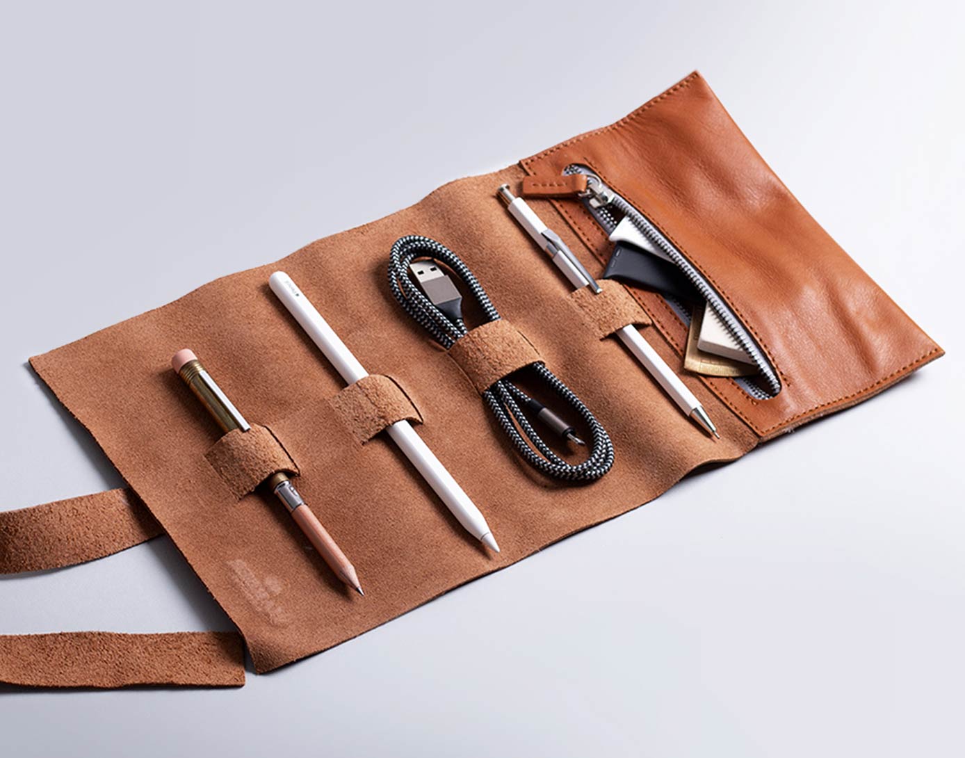 Leather organisers for cables and tools