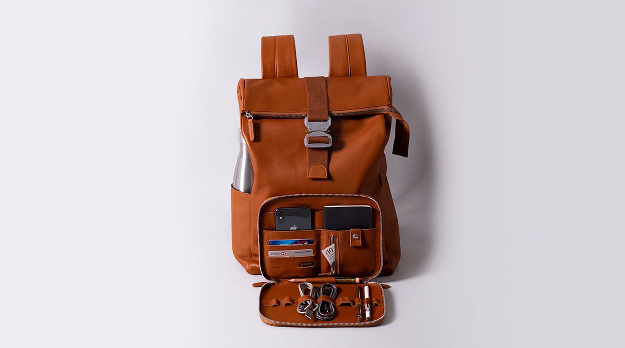 Rolltop leather backpack with front insert