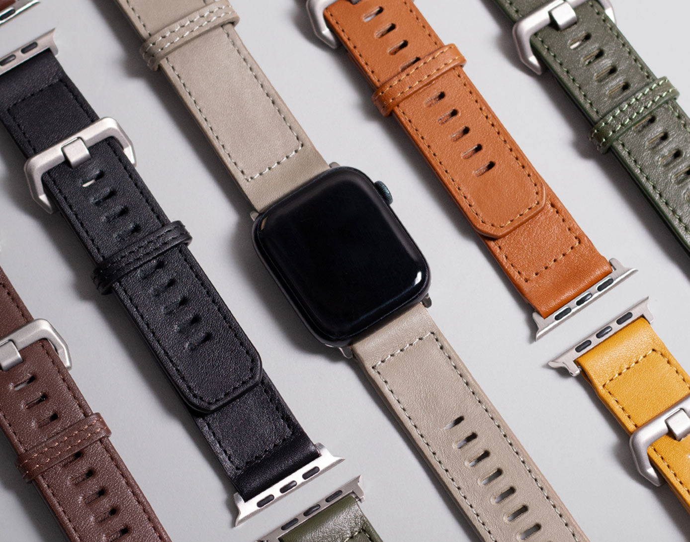 Collection of various leather watch straps in multiple colours