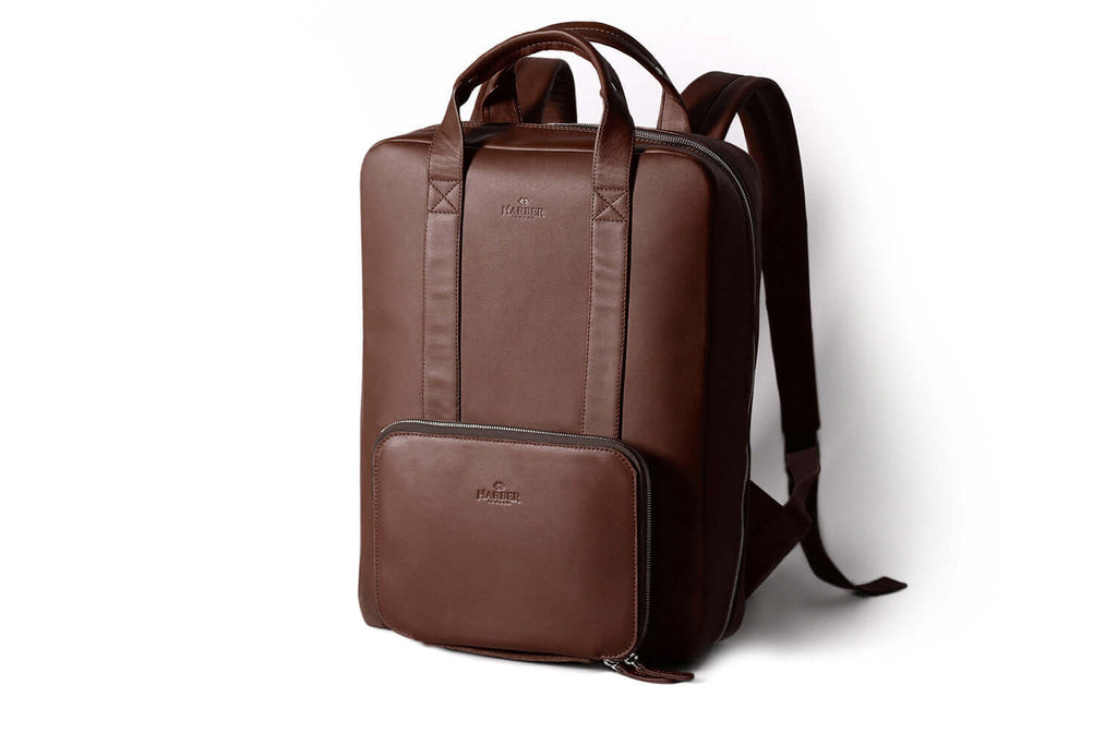 db leather backpack The Petite Portmantos the bag has internal and external pockets to keep your belongings organized Modular Leather Backpack Deep Brown