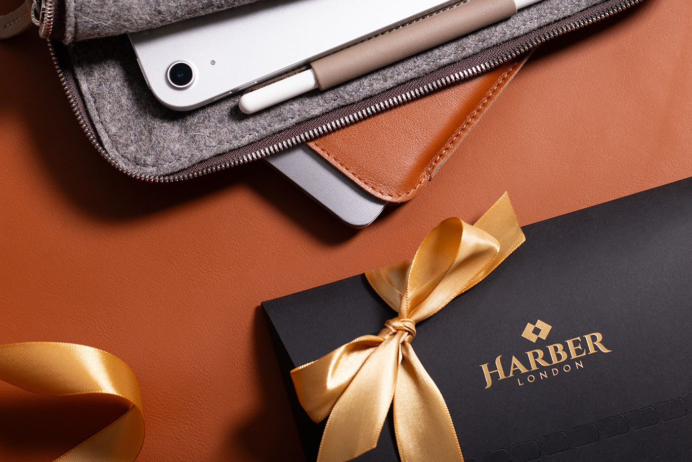 Luxury leather cases for MacBook, iPad and iPhone. Premium gift packaging
