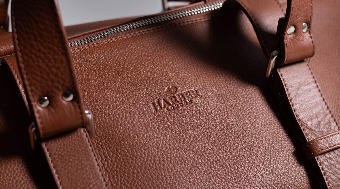 Luxury leather travel bag Harber London logo