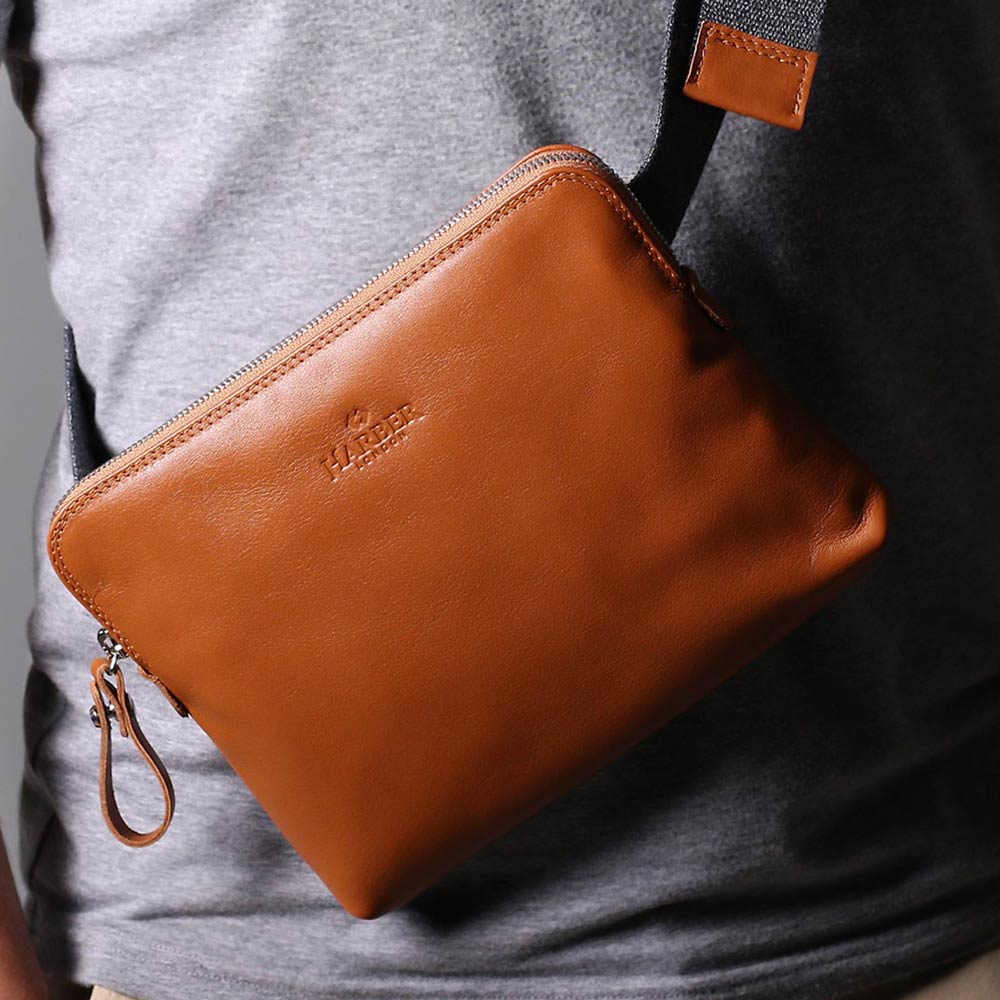 Leather sling bag for travel