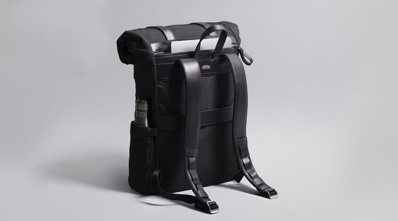 Black backpack with back laptop pocket 