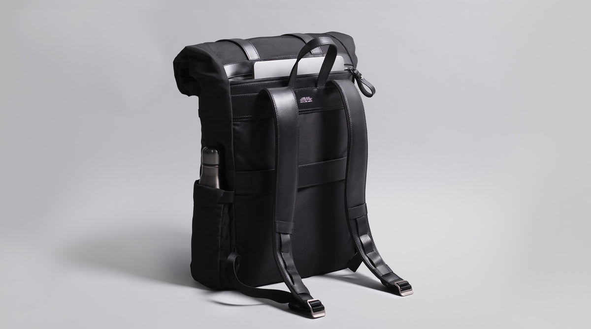 Black backpack with back laptop pocket 