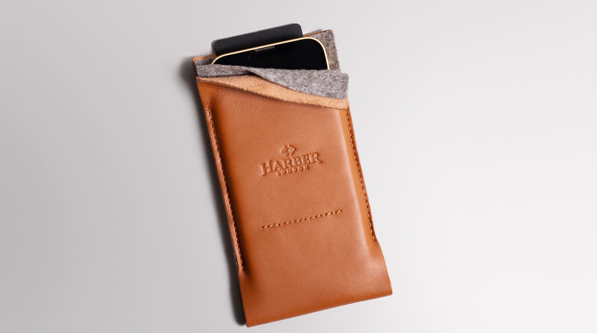 Leather sleeve for iPhone and cards.