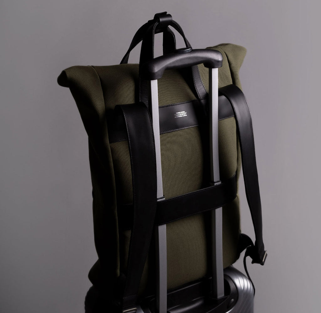 Travel ready roll top backpack 